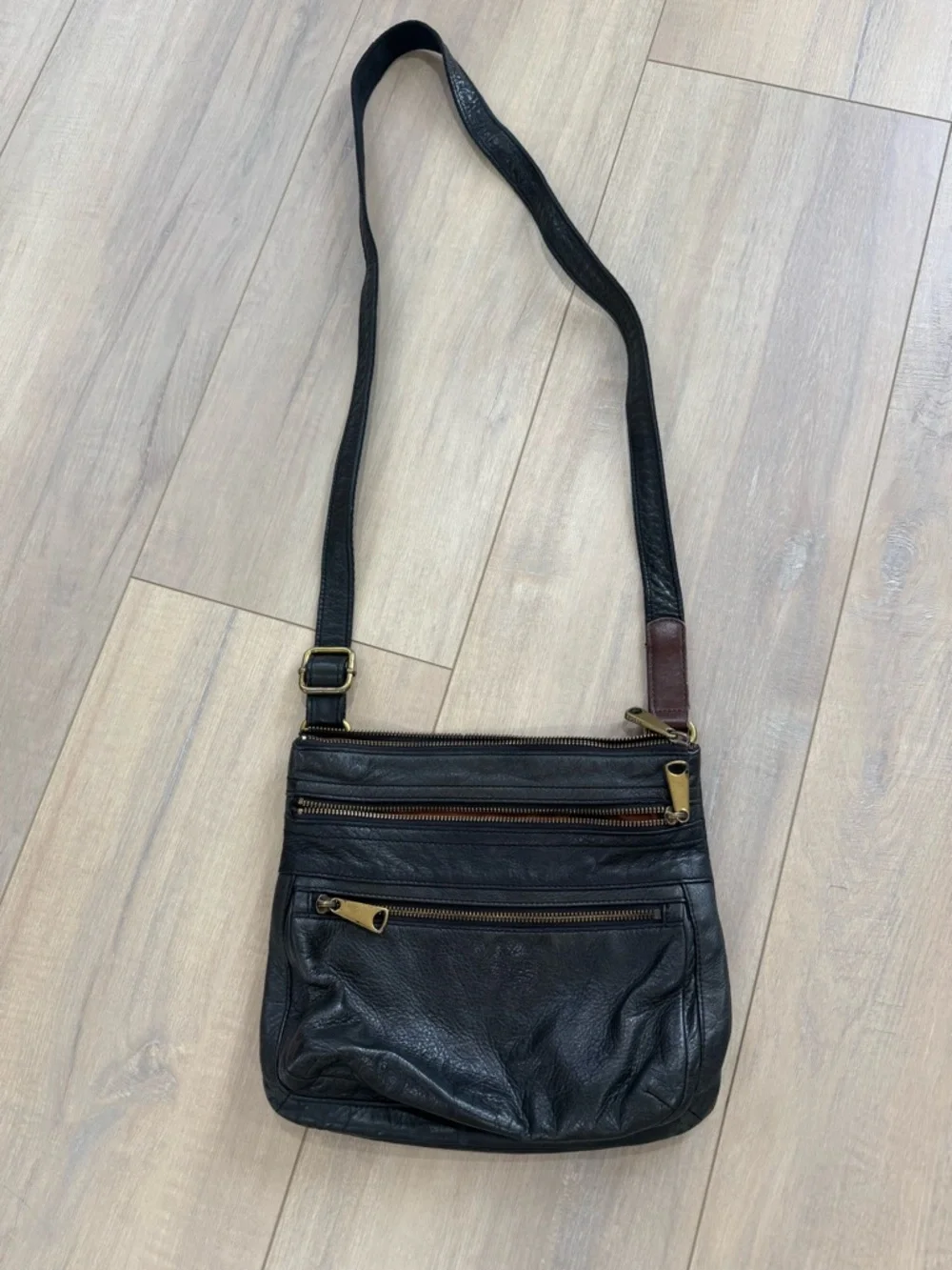 Fossil Black Leather Crossbody with Brass Accents